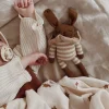 Dziergany królik z wełny alpaki - sand striped romper
