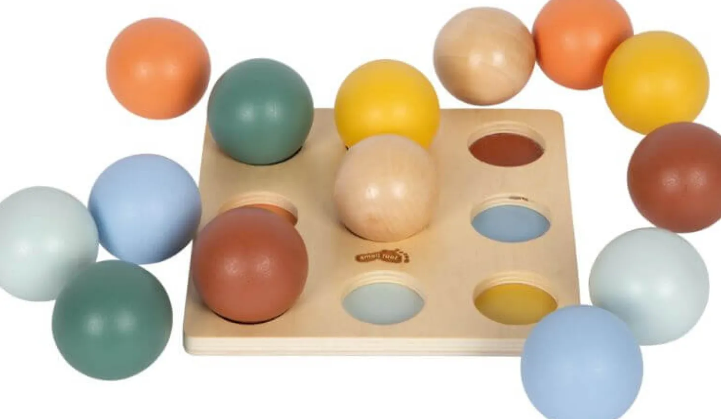 Edukacyjny sorter Montessori z drewnianymi kulkami i planszą