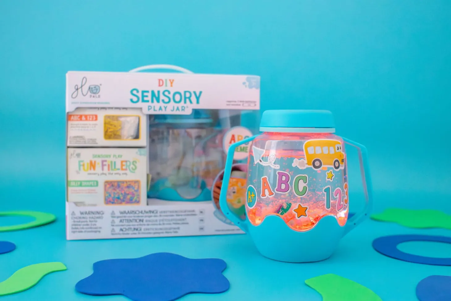 Zestaw sensoryczny DIY, świecący słoik z brokatami i figurkami Fun Fillers + naklejki gratis - ABC